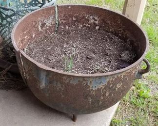 Large cast iron pot, sold as is