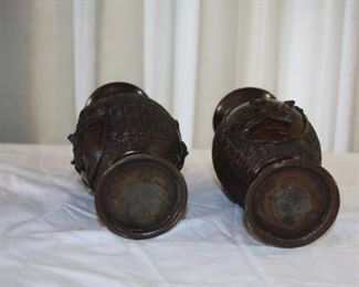 pair of Japanese bronze vases, 20th c. measure approx. 8 3/8" tall 3 7/8" dia. - asking $495 for the pair. 