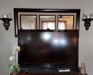 Large flat screen TV. Wall decor