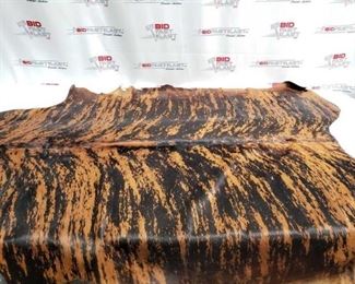 14	

Large Brazilian Brindle hair on cowhide rug. Measures approximately 38-46 square feet.
Large Brazilian Brindle hair on cowhide rug. Measures approximately 38-46 square feet.