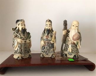 Carved resin Asian figures