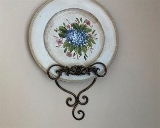 there are two coordinating plates and holders