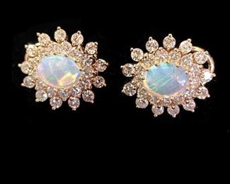 Opal and diamond earrings pierced