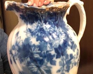 Rare Antique Saskia  Flow Blue Pitcher highlighting the beautiful swirl design in this gorgeous pottery piece.  