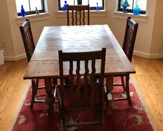 Farmhouse Pub Style Kitchen Table with Wavy Design Back Chairs. Very unique. 