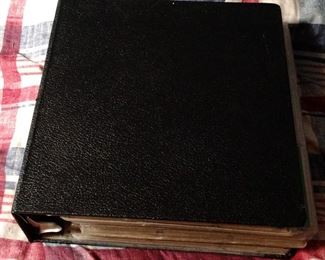 Black Binder filled with Baseball cards,  starting in late 1950.  This binder holds 45 plastic sleeves featuring  9 cards.