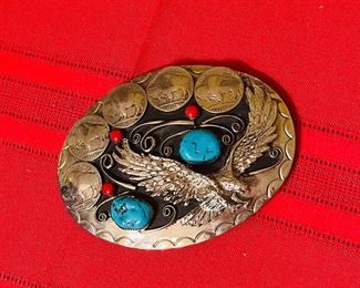 This unique one of a kind Belt Buckle features the Eagle, Turquoise Stones, Silver Old Nickels. Very Unique. 