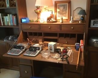 Desk has two book shelves on either side. All sold separately but makes a unique wall  console
