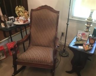 Goose neck rocker and side table and lamp have matching table and lamp on other side of sofa Christmas items grouped here