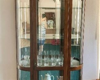 **sold**

China Cabinet with curved glass sides, lighted 
- Pool House 