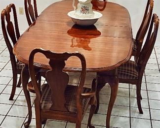 Gorgeous Dining table Queen Ann legs in Mahogany + 2 Arm Chairs + 4 Side Chairs. Table has 2 leaves as shown in the picture. 
Williams Furniture
Sumter, South Carolina  Made in USA
- Pool House 