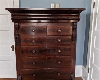 Tall mahogany chest of drawers.
