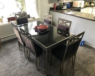 Beautiful metal dinner table with black glass top 1/2