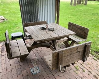 Handmade wooden table with four attached benches 1/2