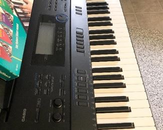 Casio Electronic Keyboard and Stand 2/2