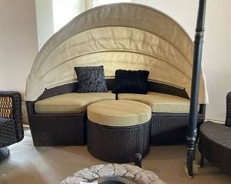 Outdoor covered sofa and ottoman
