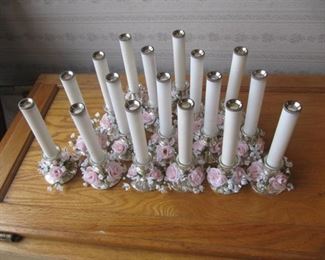 17      7" tall candle holders trimmed with pink roses
