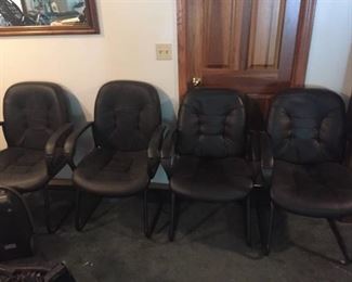 4 Black office chairs 3 chairs are like new one has scratches
