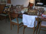 Teak abd Veneered laminated top dining table and teak chairs. Very 1960's retro look!