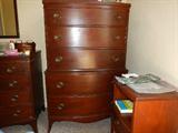 Bottom drawer is cedar lift-top drawer.