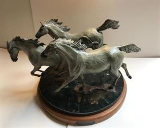Starr York Bronze Sculpture on a rotating pedestal 