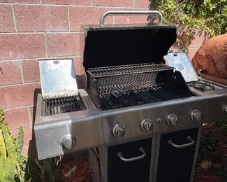 Amazing bbq -6 burner, converted to natural gas with all connections, full cabinet below, cooking tools included $200.