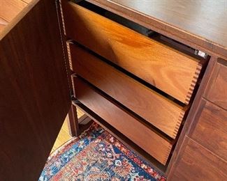 Jens Risom Walnut Cabinet with Sleigh base leather covered door Model #6362   65.25w x 19d x 35h