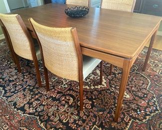 Jens Risom Rectangle dining table in Walnut with pull out inserts to extend seating With 6 dining chairs, 67w x 41d x 29h extends to 92 or 117w
