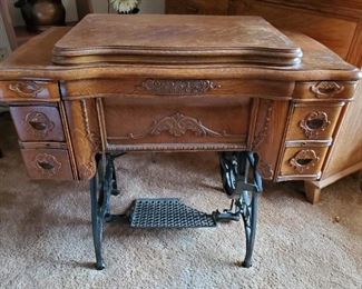 Ornate antique White sewing machine cabinet