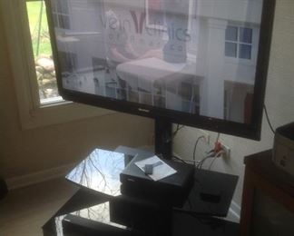 TV stand with 46" Sharp tv.  58" tall.  Presale $225.