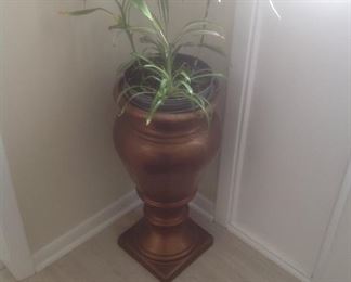 Copper urn with plant...27" t x 12" wide.  Presale $85