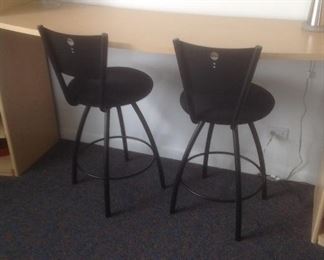 Two black metal bar stools...25" seat height...presale $45