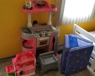 Children’s toys.  little tykes kitchen is $25.  Fold up sleeping mattress...$20