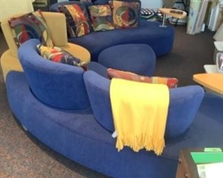 Colorful three piece sectional.  Blue sides with yellow corner and ottoman.  Has colorful pillows.  $150 presale.  Blue sides Measures 87l x 30”t x 37.5” deep. The yellow is 37” wide