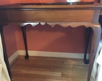 Queen Anne side table has a pull out shelf on each side.  $50