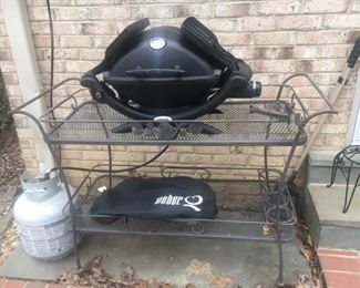 Almost new Weber mini grill, with special attachment to regular propane tank, included.  Can also use small canister that screws directly into the port.  Great for meals for 1-3 people.  Side drop down and hold gear.  $100.  Salterini cart is highly useful on any patio. $200