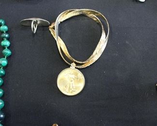 Fine gold vintage $50 coin (.999) on 14 necklace and frame