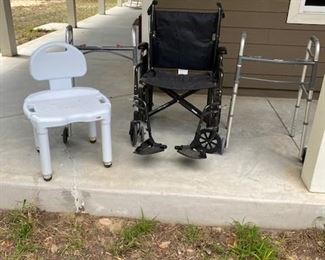 Large wheelchair, 2 walkers, bathtub chair