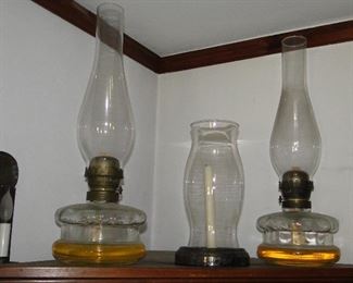 Tall Oil Lamps 21" tall $125 for pair Hurricane in center $20