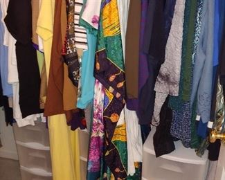 Huge amount of dresses .T shirts,pants you name it--' size large to extra large
Boxes of sweatshirts. All clean and folded