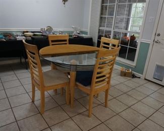 Dining table & four chairs with cover