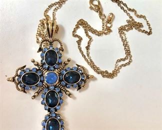 $25 Multi colored blues cross necklace 