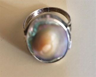 $30 Mother of pearl and sterling silver ring.  0.9"L; 0.6"W and size 7.5