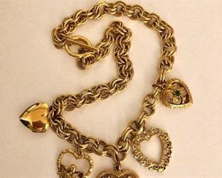 $30 Vintage gold tone many types of hearts necklace 
