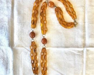 $30 Early plastic butterscotch  multi hoop necklace 30" Long 