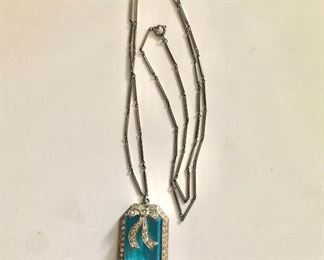 $85 Art deco blue glass and rhinestone necklace.  Necklace: 31"L.  Pendant: 2"L