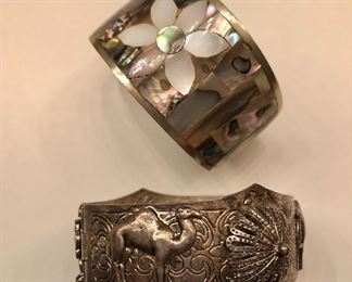 $25 each silver tone and alpaca silver cuff bracelets  Top bangle with white flower SOLD 