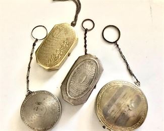 $20 each Art deco containers or coin holders on chains.  Top left: 10"L.  Pendant: 3"x1.5".   Bottom left: 2"diam; 4.5"L.  Middle: 3"x2.5".  Chain: 4"L.  Bottom right: 2.5"diam; 4"L 