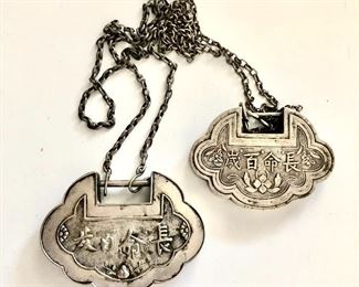 $60 each Chinese character pendants on chains 