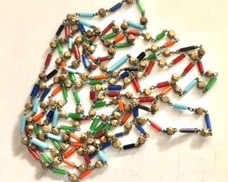 $40 Extra extra long delicately beaded multi color necklace 56" L